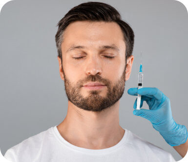 Man receiving a facial injection treatment