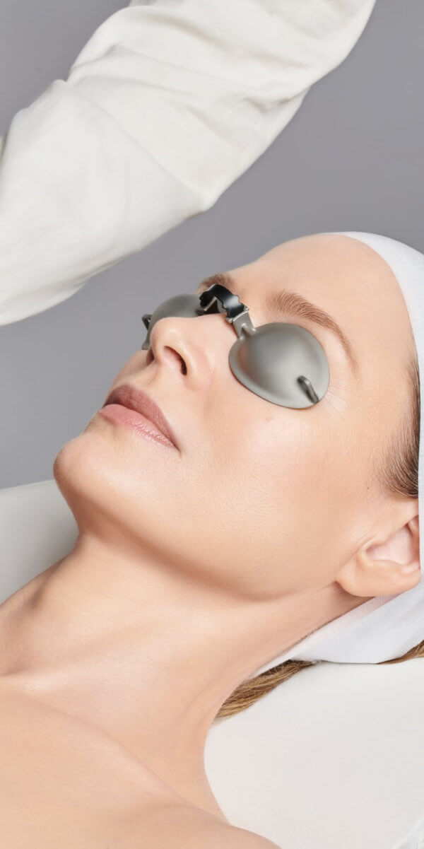 woman having medical aesthetics session