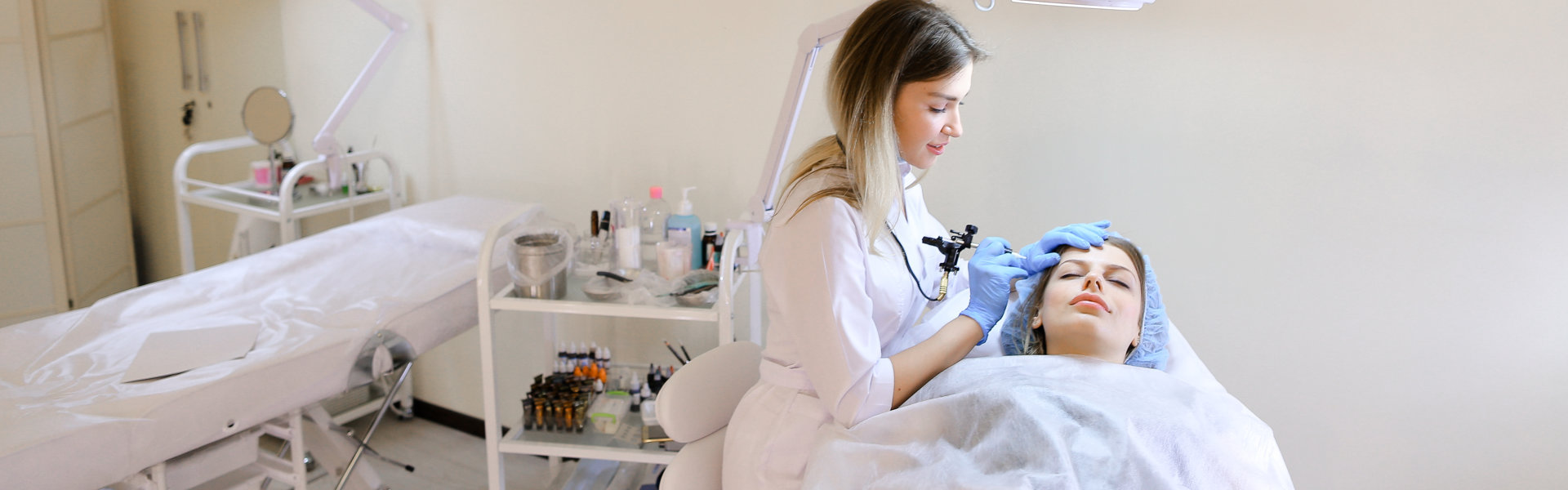 woman receiving facial treatment